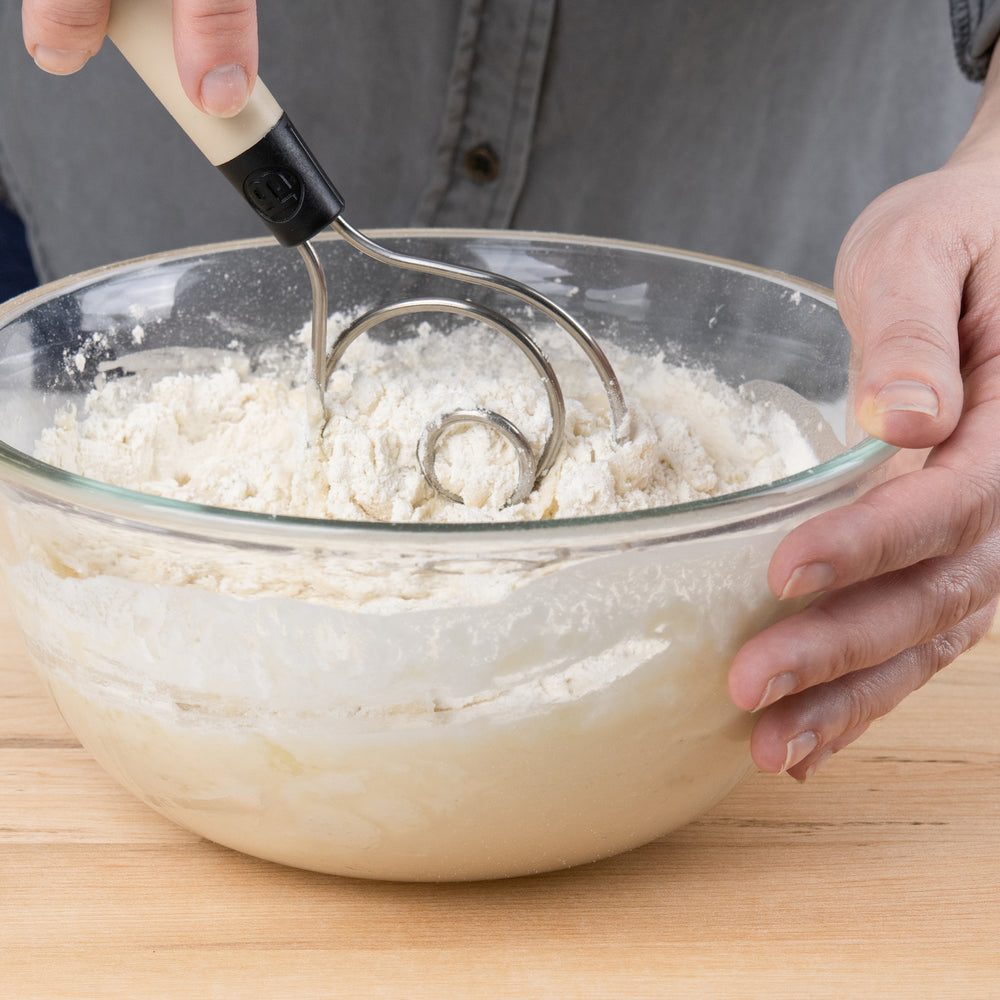 Mixing flour using the dough whisk